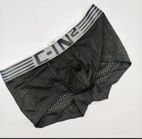 a black boxer brief with the word cn2 on it