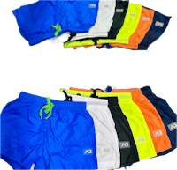 a group of men's swim shorts in different colors