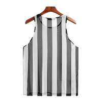 a black and white striped tank top hanging on a hanger