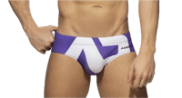 a man wearing a purple and white swim brief