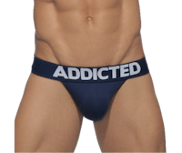 a man wearing a blue underwear with the word addicted on it